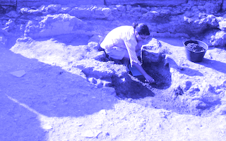 Student digging in Pompeii